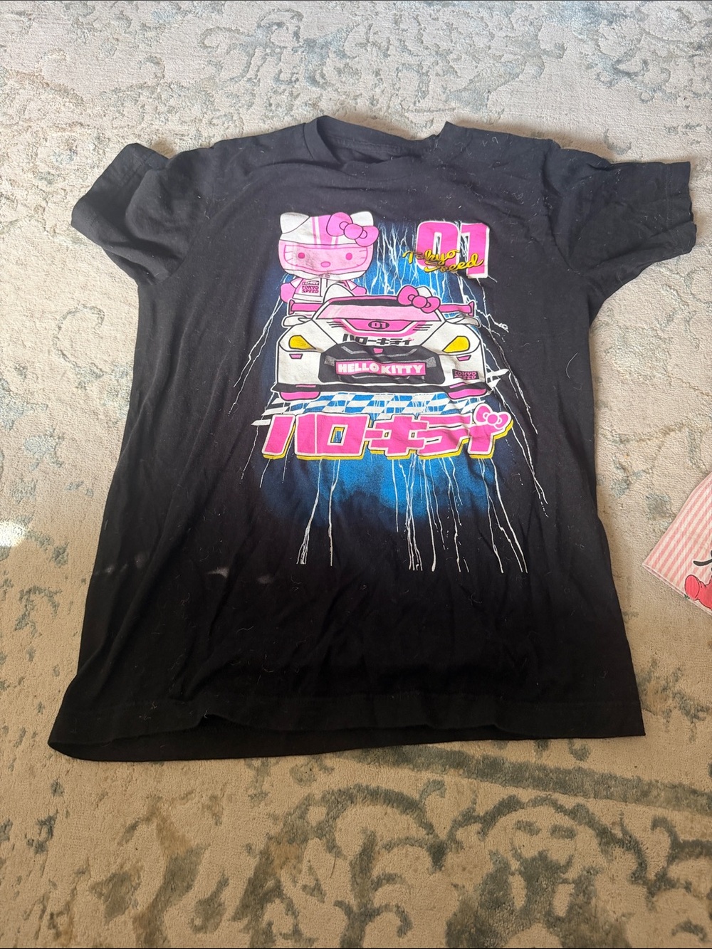 Hello Kitty Black Tee with Pink and Blue Racing Graphic